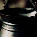 closeup of a vintage metal pot with a beautiful patina