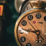 a line of antique and vintage clocks to represent the best time to visit an antique mall
